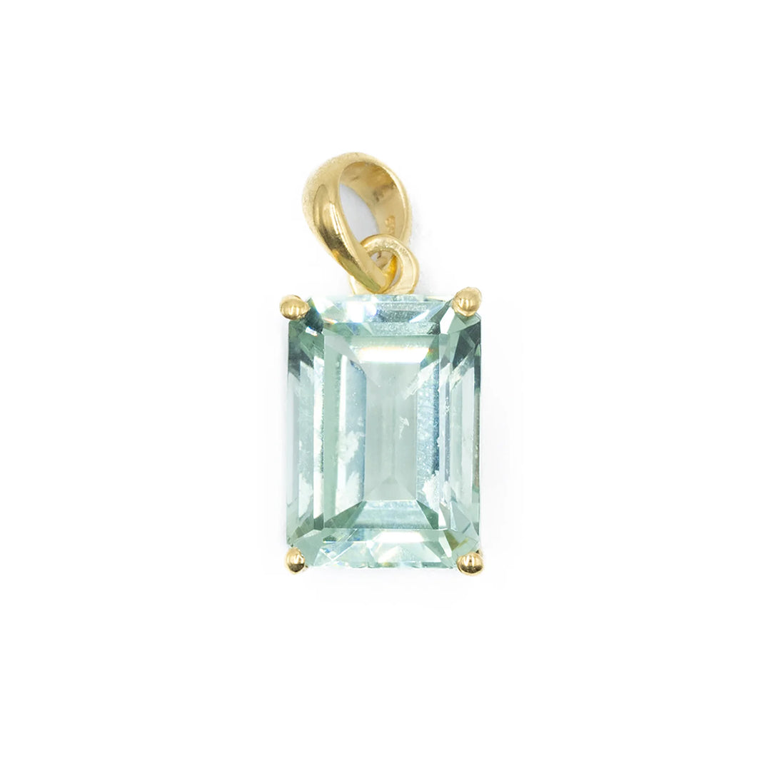 Aquamarine emerald cut gemstone, elegant minimalist design, luxurious jewelry accessory, perfect for sophisticated style