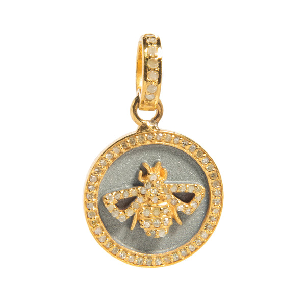 Mixed metal bee disc charm – round gold and silver pendant featuring a detailed bee design

