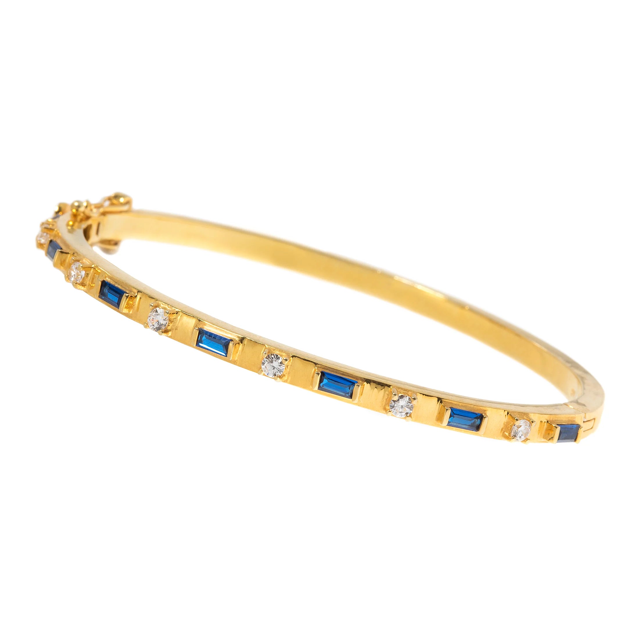 Gold blue sapphire and diamond bangle bracelet, elegant gemstone jewelry with timeless luxury design