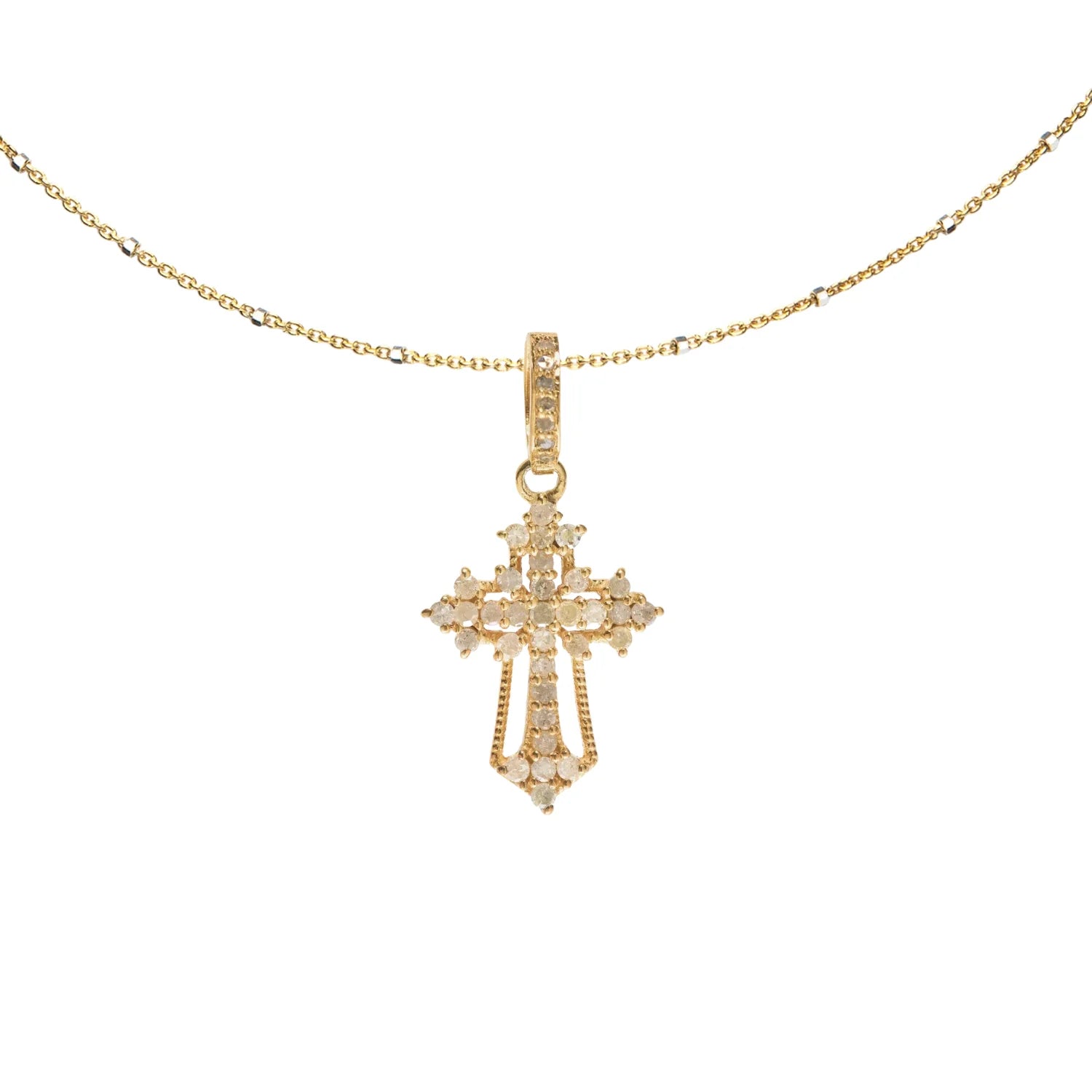 Ornate cross charm – intricately designed pendant symbolizing faith with vintage-inspired elegance