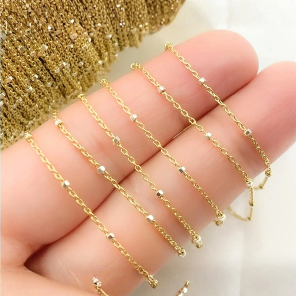 Delicate gold and silver dotted necklace with elegant minimalist design