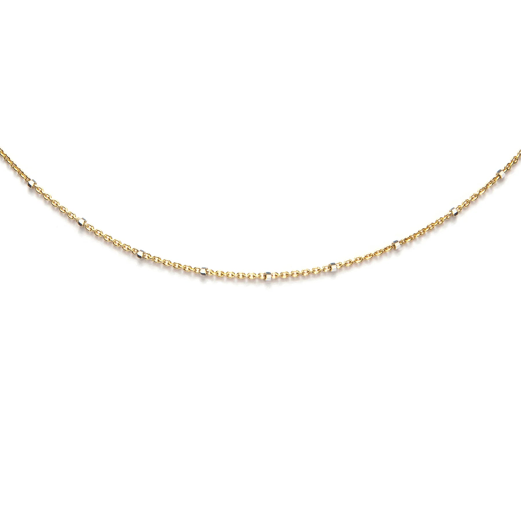 Delicate gold and silver dotted necklace with elegant minimalist design