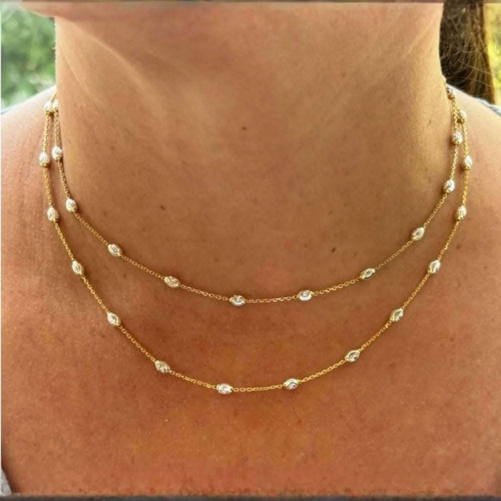 Delicate jumbo cut gold diamond necklace with elegant minimalist design, perfect luxury accessory