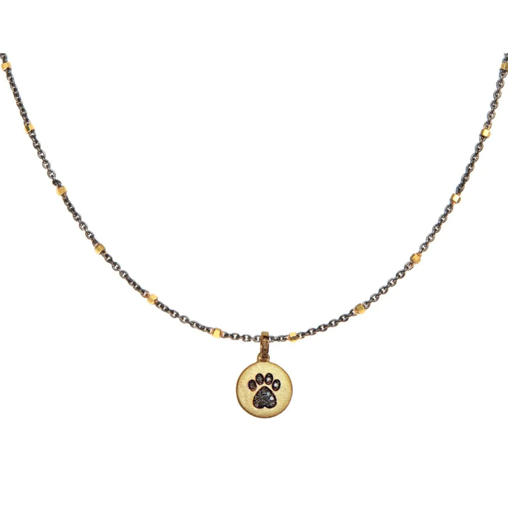 Dog paw disc charm in gold and silver, cute minimalist jewelry accessory for pet lovers