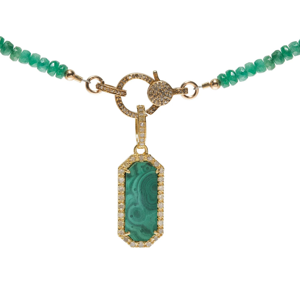 Gold dog tag charm with malachite and diamond accents – bold green pet-themed pendant