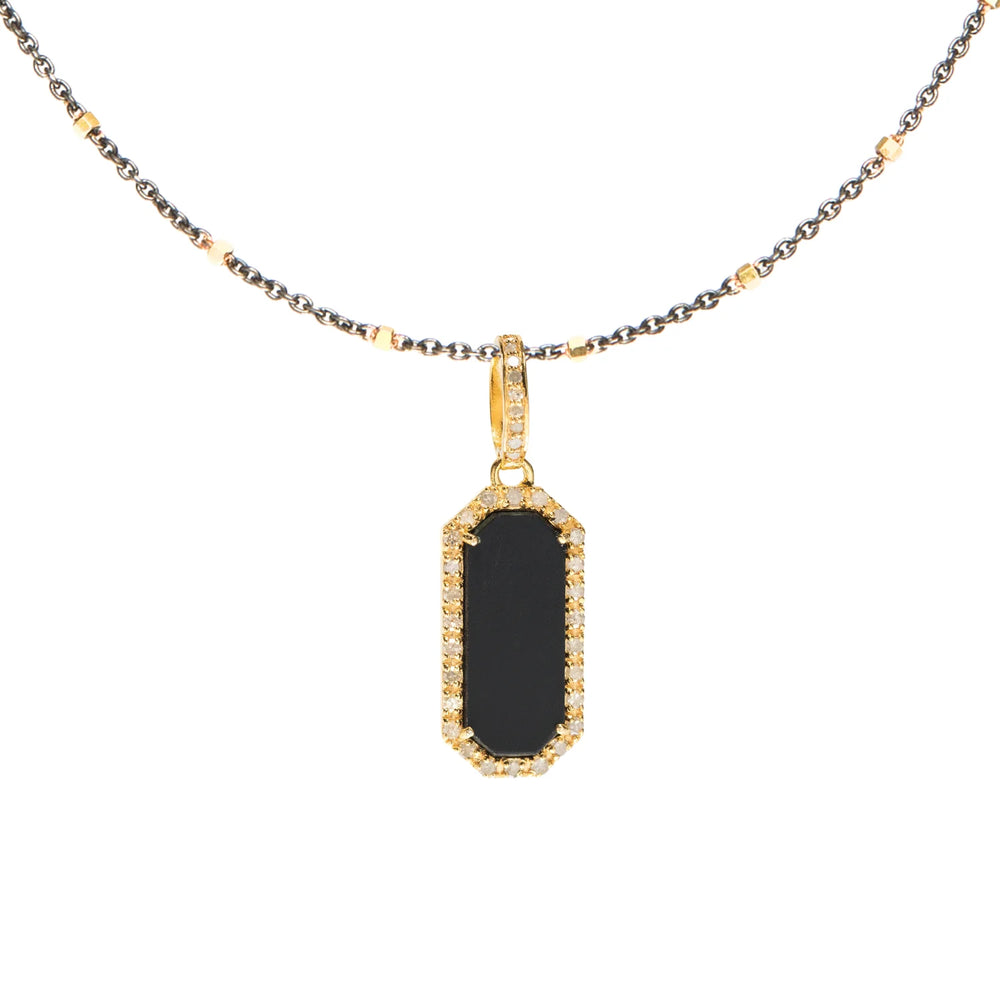 Gold dog tag charm with onyx and diamond accents – elegant pet-themed pendant