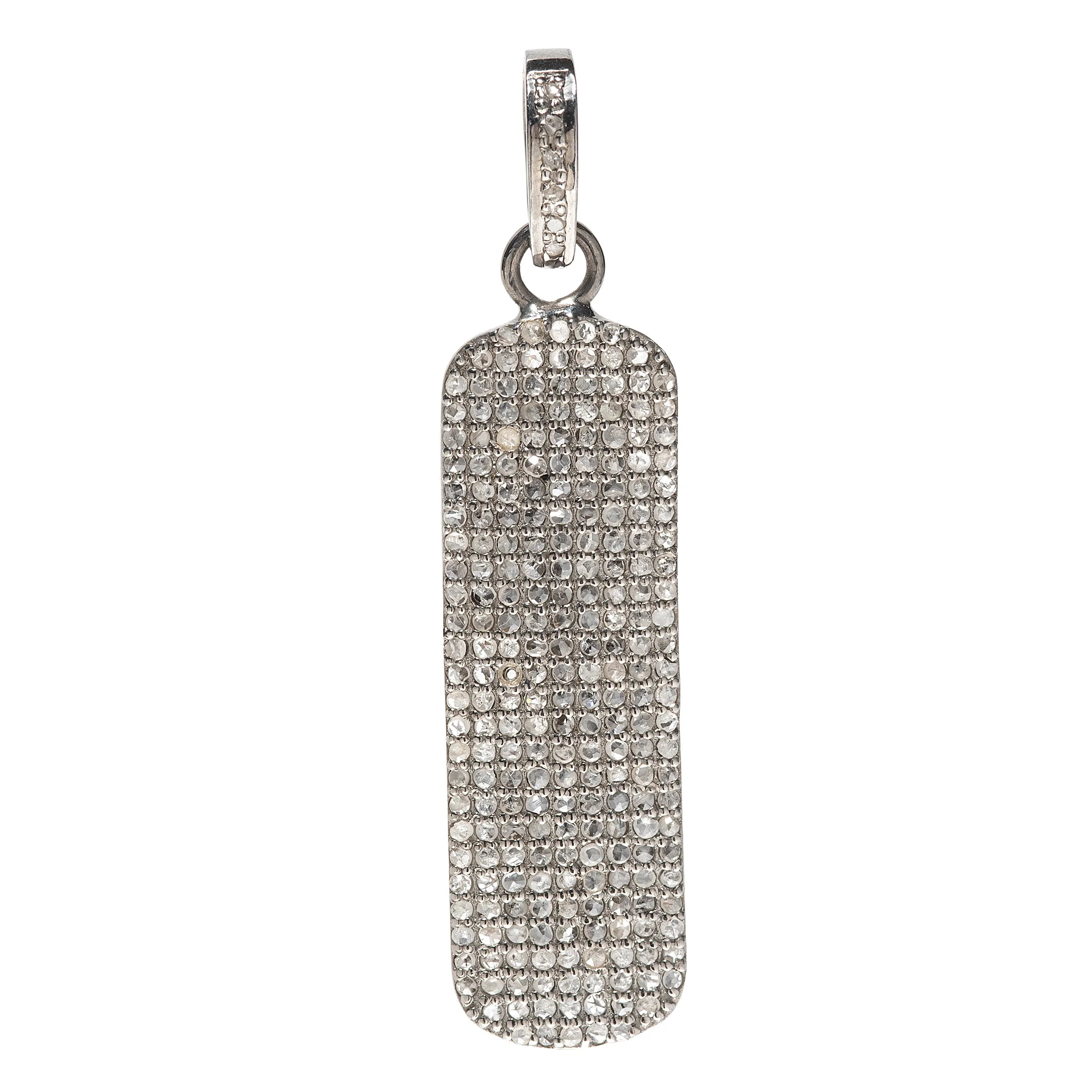 Long and thin dog tag pendant in sterling silver with a minimalist, modern silhouette for everyday wear