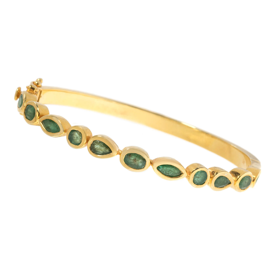 Gold emerald bangle bracelet, vibrant green gemstone jewelry with timeless luxury design