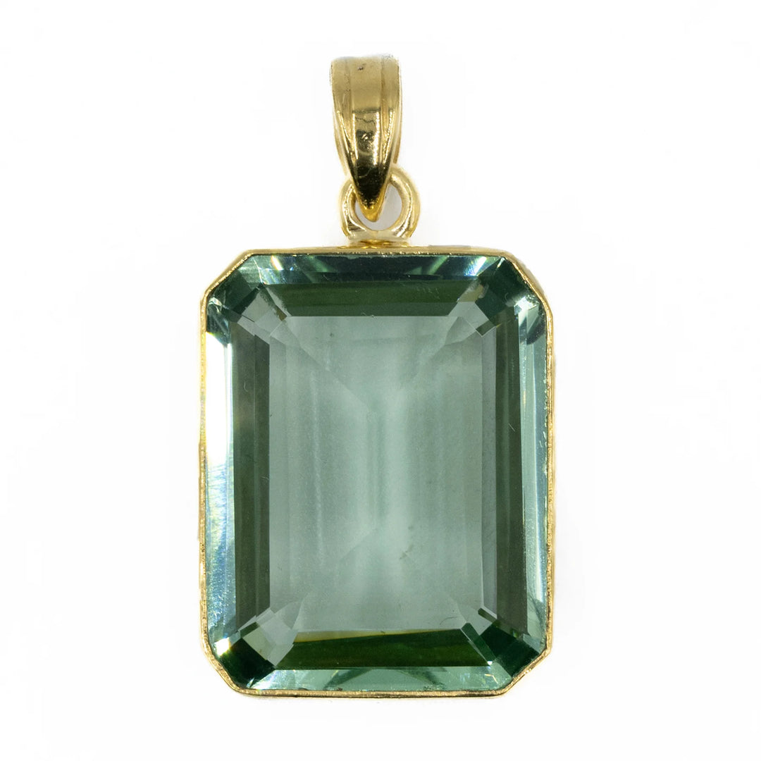 Extra-large green amethyst pendant in 18kt gold-plated sterling silver with a soft, translucent green gemstone