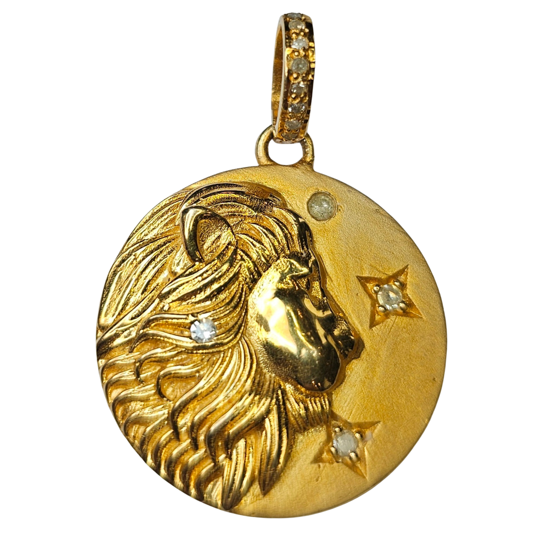 Gold pendant with a lion design and embedded diamonds on a white background