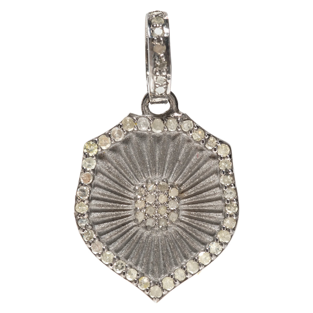 Mixed metal shield charm in gold and silver – powerful pendant symbolizing protection and resilience

